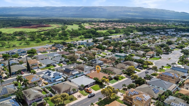 birds eye view of property with a residential view and a mountain view