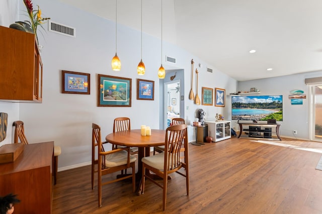 dining room with recessed lighting, visible vents, and wood finished floors