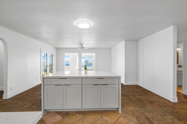 kitchen featuring ceiling fan