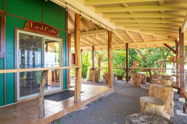 exterior space featuring lofted ceiling