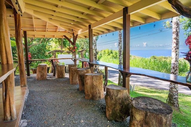 view of patio featuring a water view