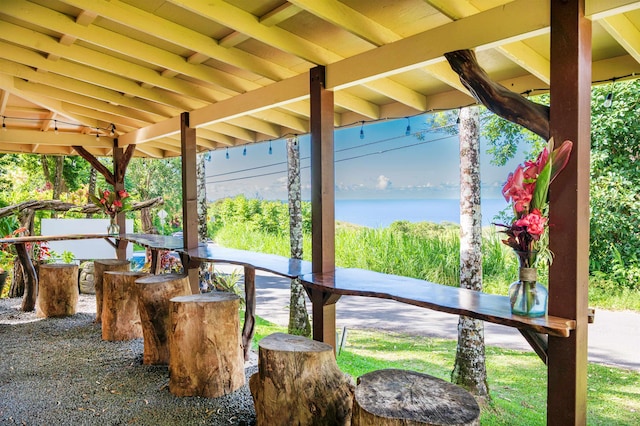 view of patio / terrace with a water view