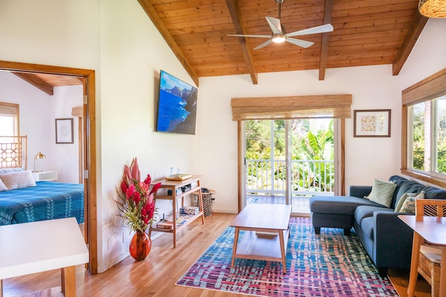 living room with ceiling fan, light wood-type flooring, beam ceiling, and wooden ceiling