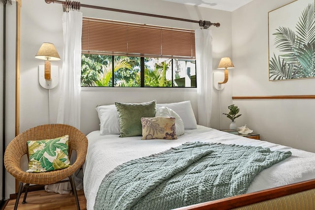 bedroom with hardwood / wood-style floors