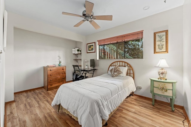 bedroom featuring ceiling fan and light wood-type flooring