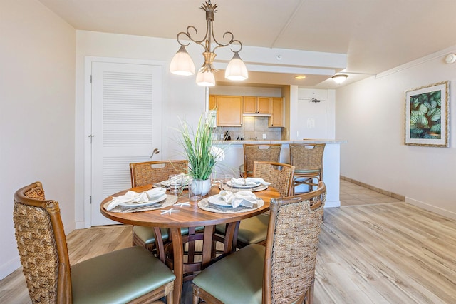 dining room with light wood-type flooring