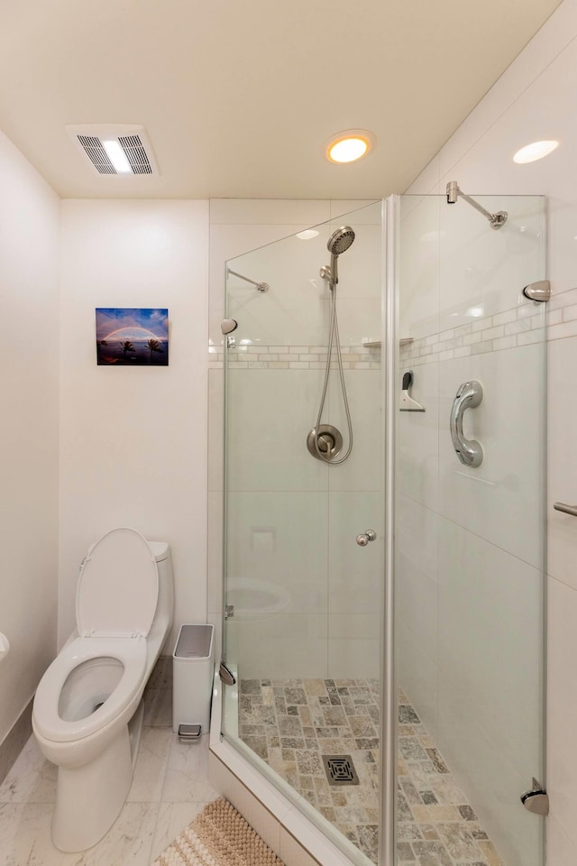 2777 S Kihei Rd Unit K 106, Kihei, HI 96753 - bathroom with toilet, a shower stall, marble look tiles, and baseboards