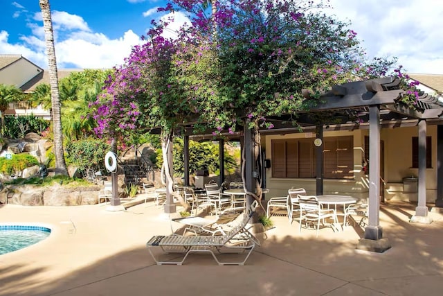 2777 S Kihei Rd Unit K 106, Kihei, HI 96753 - view of patio / terrace featuring a pergola and a pool
