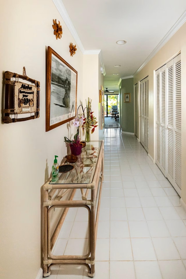 2777 S Kihei Rd Unit K 106, Kihei, HI 96753 - corridor featuring ornamental molding, light tile patterned flooring, and baseboards