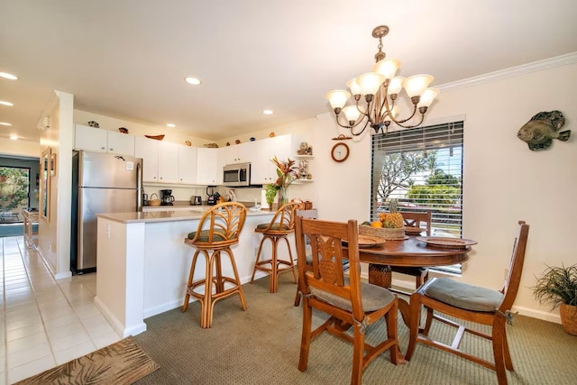 2777 S Kihei Rd Unit K 106, Kihei, HI 96753 - dining room featuring plenty of natural light, a chandelier, recessed lighting, ornamental molding, and baseboards