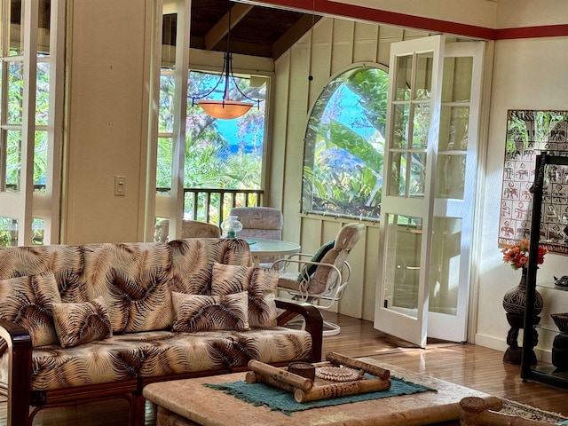 interior space featuring wood-type flooring and french doors