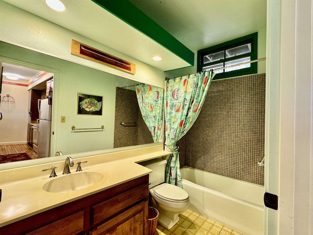 full bathroom featuring vanity, toilet, and shower / bath combo with shower curtain