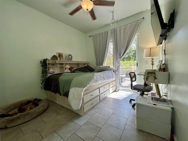 bedroom with ceiling fan, light tile patterned flooring, and access to outside