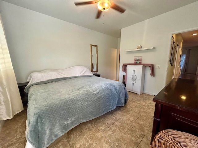 tiled bedroom with ceiling fan