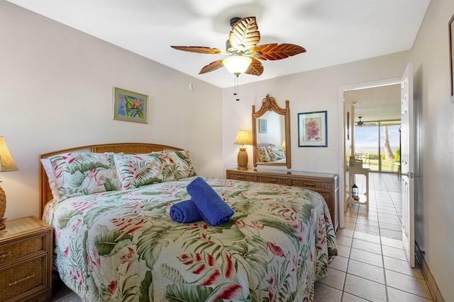 bedroom featuring a ceiling fan and light tile patterned flooring