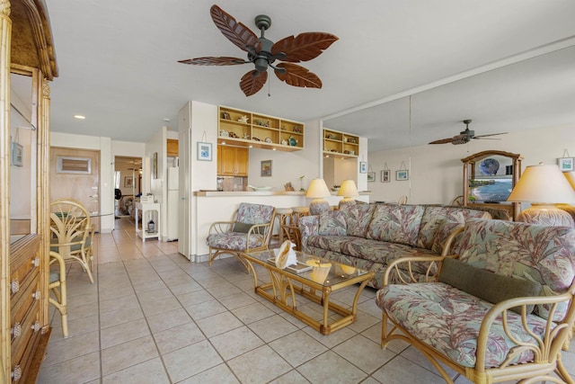 living room with light tile patterned floors and a ceiling fan