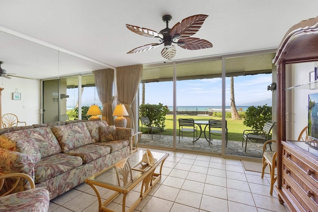 sunroom / solarium with a ceiling fan