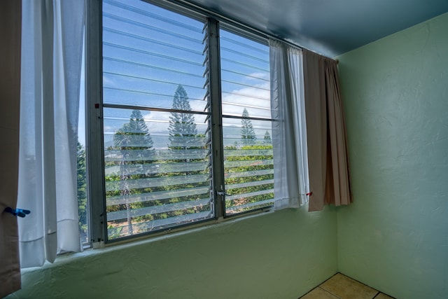 view of tiled spare room