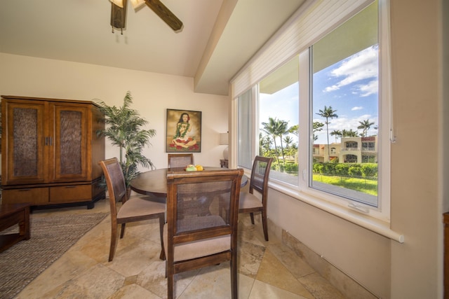 dining area featuring a ceiling fan