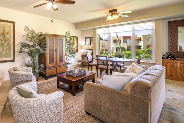 living area featuring ceiling fan