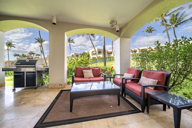 view of patio / terrace featuring a grill and an outdoor hangout area