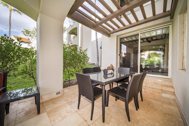 view of patio / terrace featuring outdoor dining area and a pergola