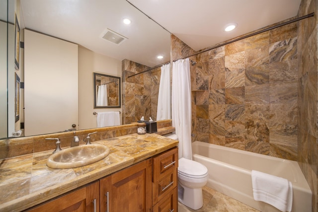 bathroom featuring toilet, recessed lighting, vanity, visible vents, and shower / bathtub combination with curtain