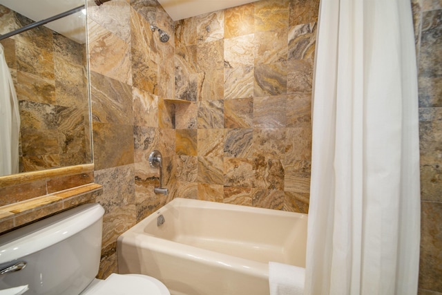 full bathroom with shower / tub combo, tile walls, and toilet