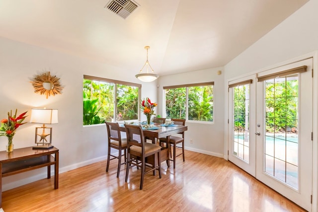 40 Hoola Lei Pl, Kihei, HI 96753 - dining space with plenty of natural light, baseboards, light wood finished floors, and lofted ceiling