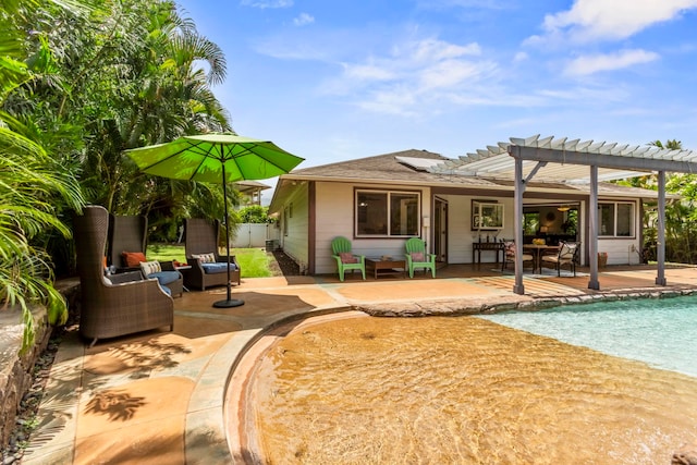 40 Hoola Lei Pl, Kihei, HI 96753 - rear view of house with a pergola, a patio area, an outdoor pool, fence, and a shingled roof
