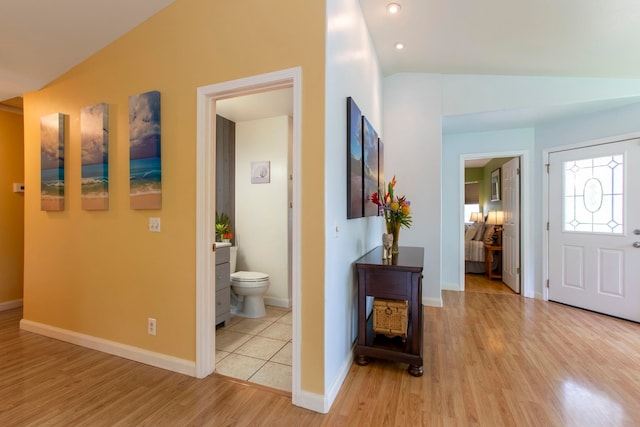 40 Hoola Lei Pl, Kihei, HI 96753 - foyer entrance featuring wood finished floors, baseboards, and vaulted ceiling
