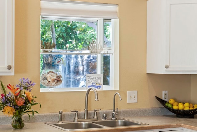 40 Hoola Lei Pl, Kihei, HI 96753 - kitchen with a sink, white cabinetry, and light countertops