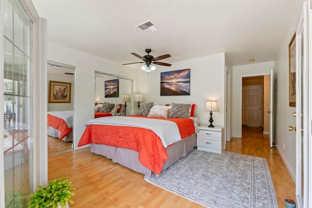 40 Hoola Lei Pl, Kihei, HI 96753 - bedroom with light wood-type flooring, ceiling fan, and baseboards