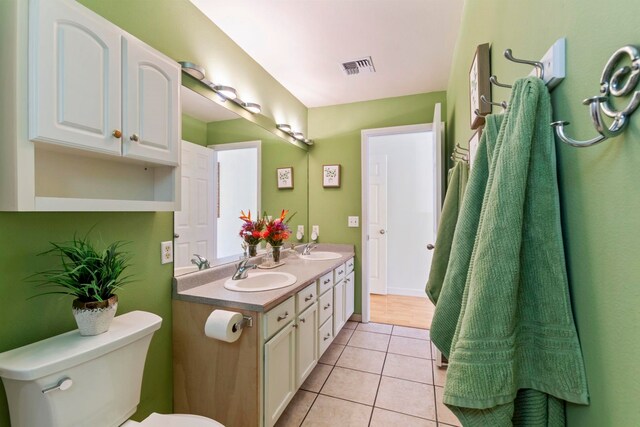 40 Hoola Lei Pl, Kihei, HI 96753 - full bathroom with toilet, tile patterned flooring, and double vanity