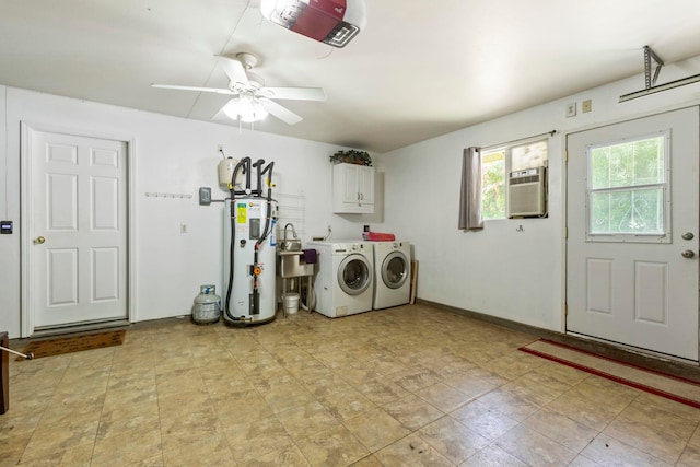 40 Hoola Lei Pl, Kihei, HI 96753 - laundry area featuring cabinet space, electric water heater, washing machine and clothes dryer, a ceiling fan, and a wall unit AC
