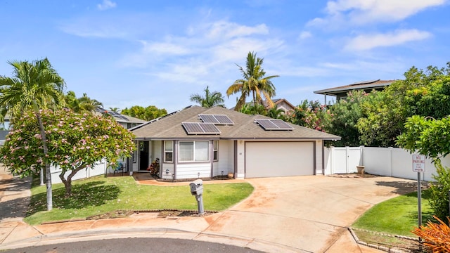 40 Hoola Lei Pl, Kihei, HI 96753 - view of front facade with a garage, concrete driveway, solar panels, and a shingled roof