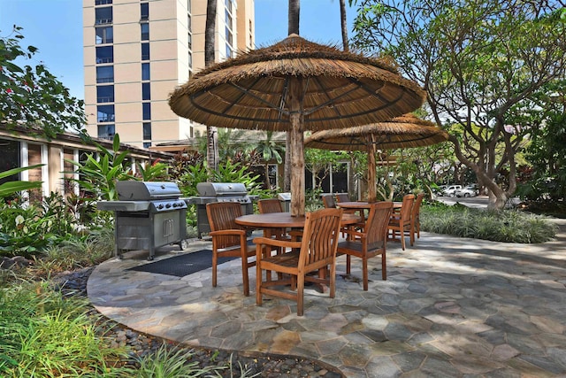 view of patio featuring a grill