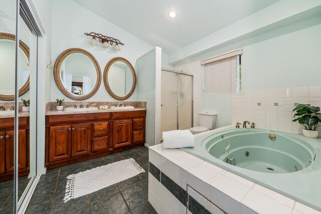 bathroom featuring tile patterned floors, vanity, toilet, curtained shower, and lofted ceiling