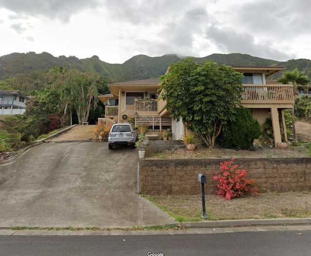 view of front of home featuring a mountain view