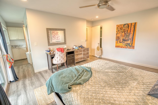 bedroom featuring recessed lighting, baseboards, and light wood-type flooring