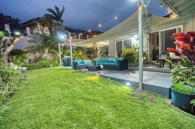 view of yard featuring outdoor lounge area and a patio