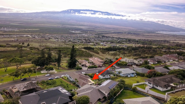 bird's eye view with a residential view and a mountain view