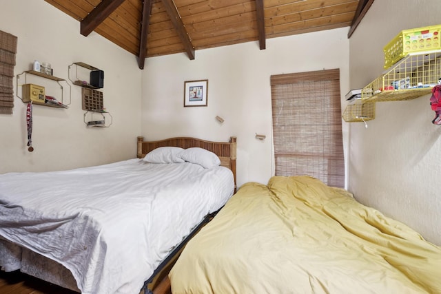 bedroom featuring lofted ceiling with beams and wood ceiling