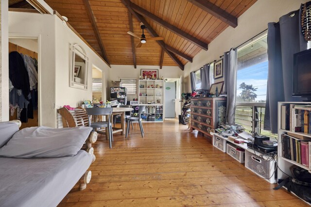 interior space featuring wood ceiling, vaulted ceiling with beams, and hardwood / wood-style floors