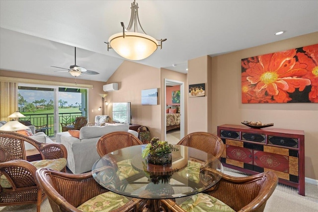 dining area with an AC wall unit, carpet flooring, ceiling fan, and lofted ceiling