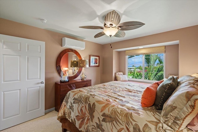 bedroom featuring ceiling fan, a wall unit AC, and light colored carpet