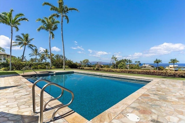 pool featuring a patio area