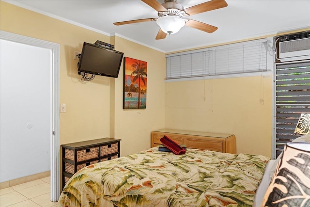 bedroom featuring ornamental molding, a ceiling fan, a wall unit AC, and light tile patterned flooring