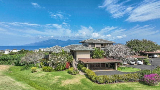 100 Ridge Rd Unit 2721, Lahaina, HI 96761 - view of front of property with a water and mountain view and a front lawn