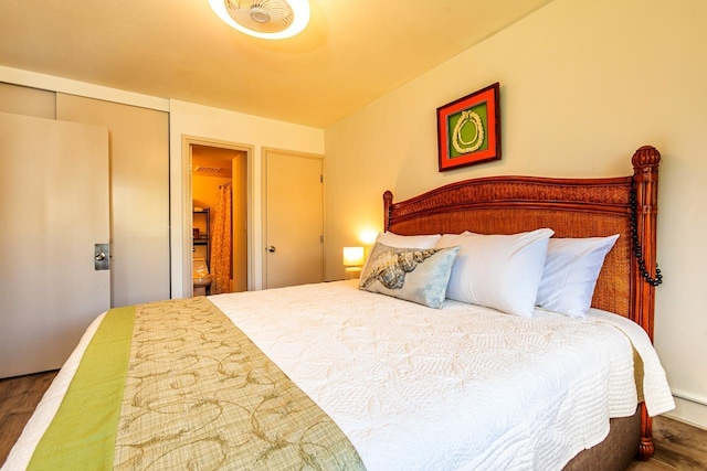 bedroom featuring a closet and hardwood / wood-style floors